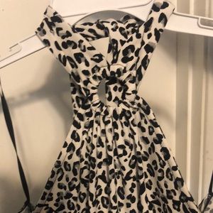 Medium halter keyhole cheetah print,ties at the top.super cute.